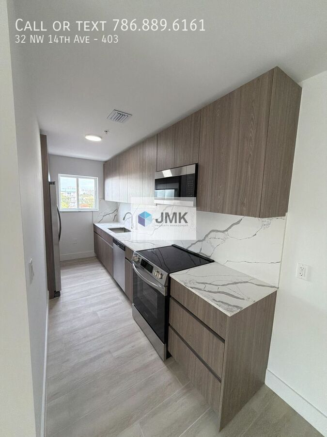 Brand-New 4 Bed / 2 Bath Condo – In-Unit Washer & Dryer property image