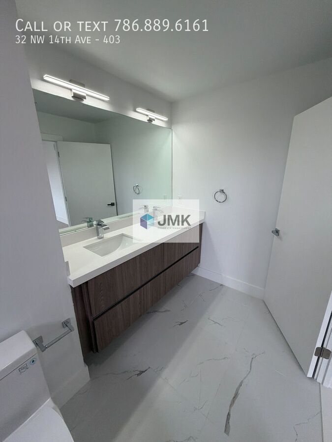 Brand-New 4 Bed / 2 Bath Condo – In-Unit Washer & Dryer property image